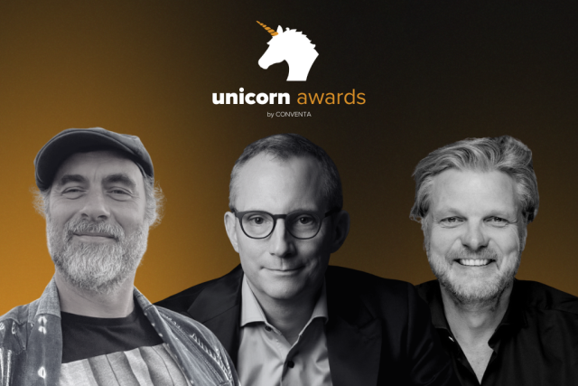 unicorn_awards Unicorn Awards logo with three men posing against a dark orange gradient background, smiling faces visible.